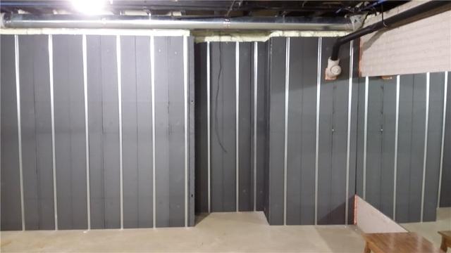 These foam panels fastened to the foundation provide a warm barrier.