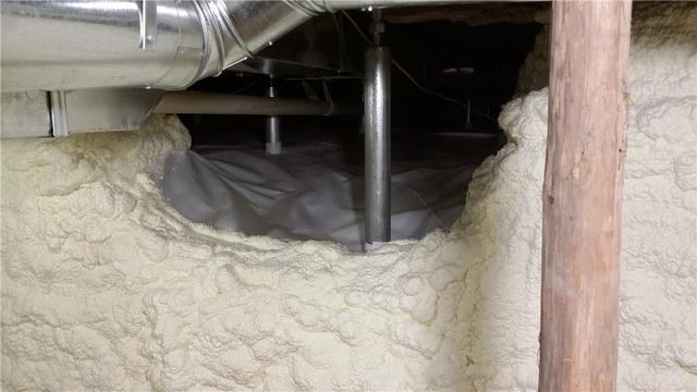 Spray foam insulation seals off tight gaps around the CleanSpace liner.