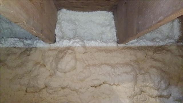 Spray foam around joists