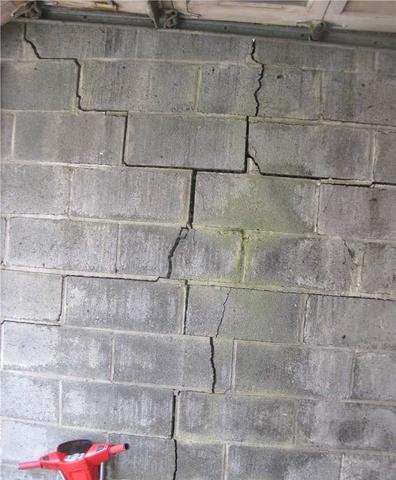 Large Stair Case Cracks form in Foundation