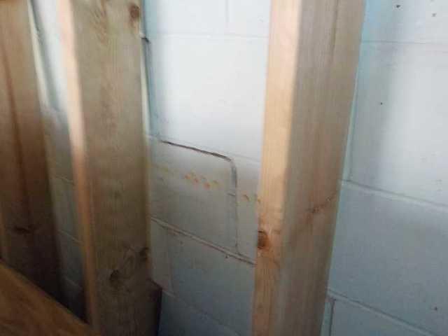 Close Up of Stair Step Crack in Block Wall