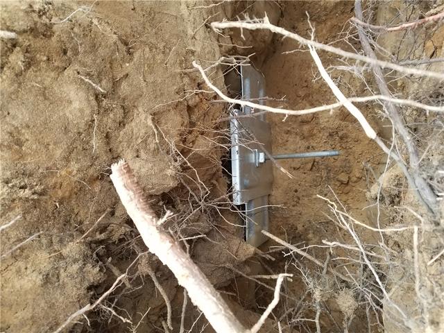 Wall Anchor Secured in Ground