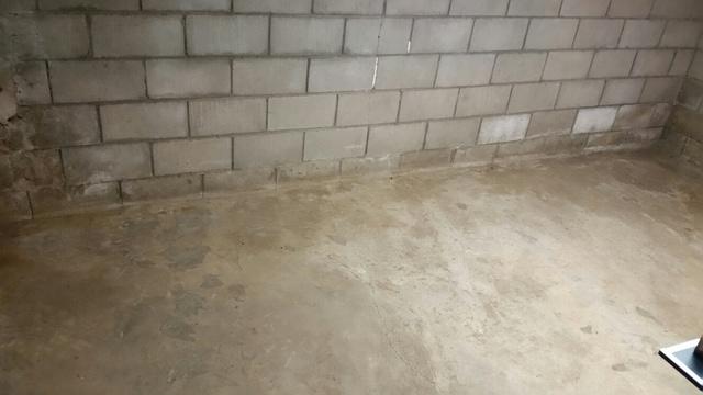 Water Damage at Base of Walls