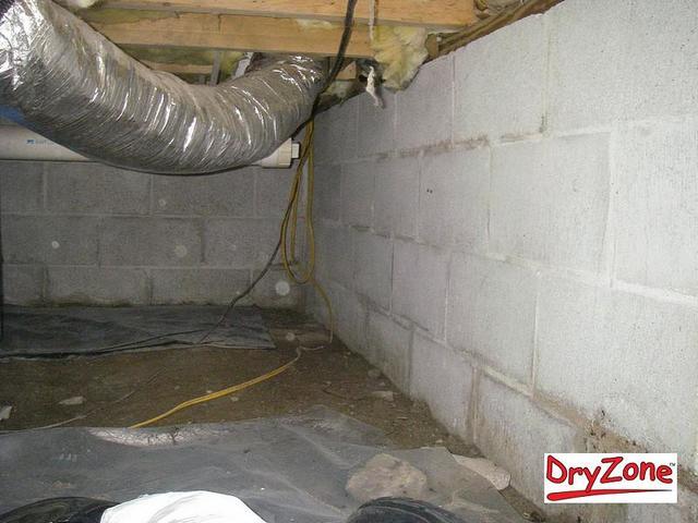 Bare walls in the crawl space