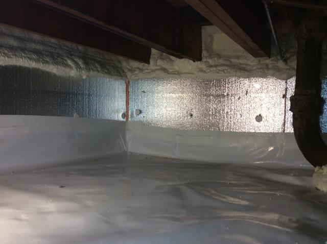 Remove and dispose of existing fiberglass and debris in crawl space. Supply and install CleanSpace Crawl encapsulation with 2'' Silverglo bolted and air sealed to side walls 1" TerraBlock insulation on floor covered with cleanspace vapor barrier liner. Reduce heat loss and infiltration of cold air by sealing and insulating the Rim Joist area with approximately 2" closed-cell polyurethane spray foam insulation.