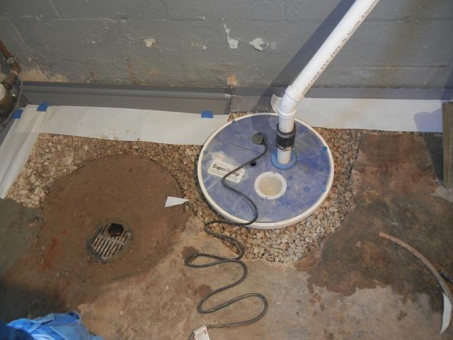 <p><a href="https://www.suredrybasements.com/sump-pump.html">SuperSump sump pump</a> system installed and ready to be concreted.</p>