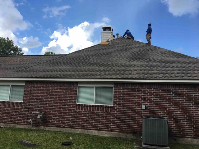 The highest ridge cap is always the last part of the work, excluding the crew's magnet run, which is done as the entire crew walks around the house, searching for debris and nails coming off the roof.