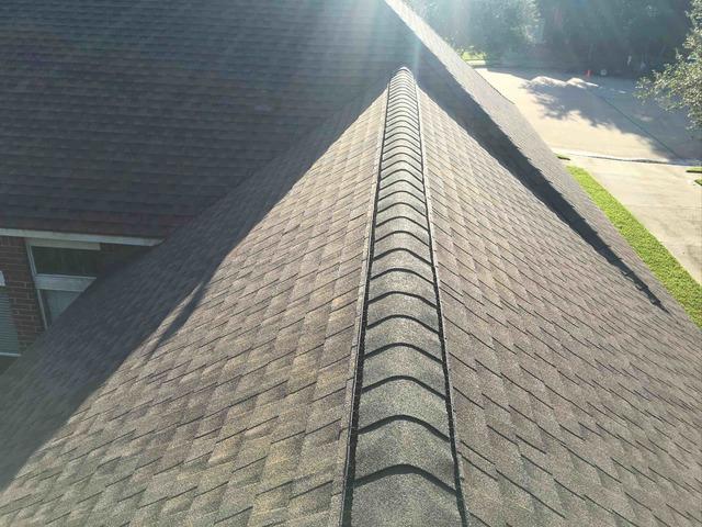 One easy way to figure out if you have a decent crew or a lazy crew is to stand back at the ridge and see how straight your ridge came out. The professionals always place chalk lines to mark straight lines, no matter how many years they've been doing it.