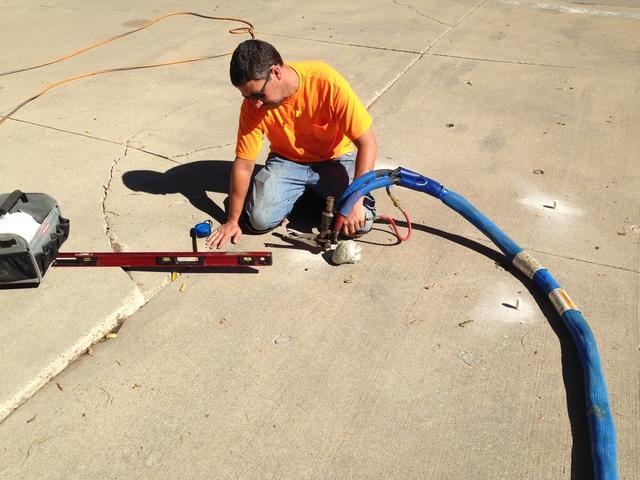 <p>Injecting concrete with <a href="https://www.suredrybasements.com/foundation-repair-wisconsin/concrete-lifting/polylevel-injection.html">PolyLEVEL </a>to lift it back to its original position.</p>