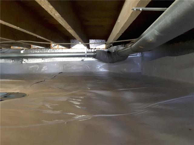 CleanSpace is a bright white, durable liner that will seal off and protect the crawl space from water and pests. The liner is mold and moisture resistant which will protect the structure of the foundation. A Crawl Space SmartSump pump system was also installed to assure the crawl space will always stay dry.