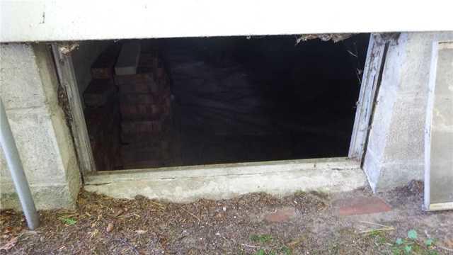 Crawl Space Entrance is Susceptible to the Elements