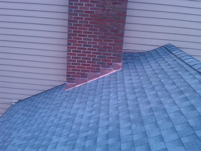 <p>Asphalt roof installation with copper step flashing in Radnor, PA. Proper flashing installation is crucial to prevent roof leaks!</p>