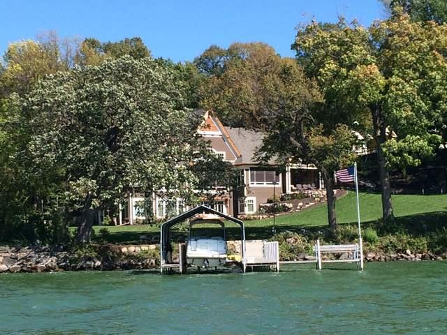 <p>From the lake or any angle, the copper gutters look great on this home.</p>