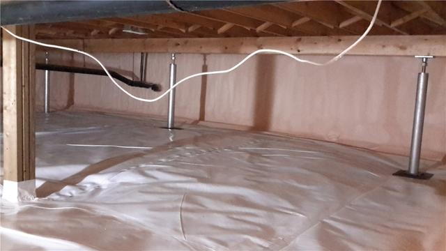 Here you can see our Smart Jack support columns, our spray foam insulation and the Clean Space Encapsulation Barrier. It's now a bright, clean, usable space.