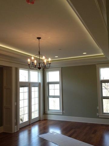 Chandler, recessed cans and soft white lighting in the soffits