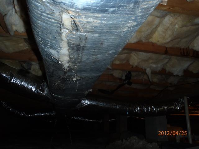 Over time the duct work in the typical Delmarva crawlspace begins to deteriorate. The temperature difference between the air in the duct work and the crawlspace forms condensation on the duct work. The outside protective liner splits exposing the insulation.