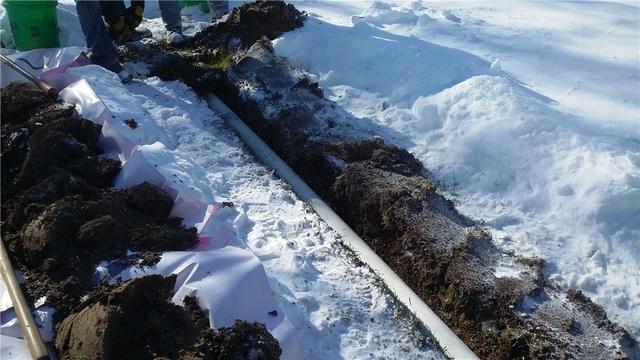 Discharge Line Keeps Water Away From House