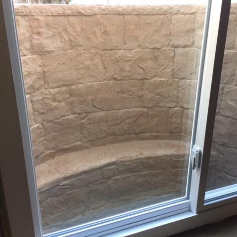 This homeowner chose the tan window well to match their home's siding- we installed a larger 4 foot by 4 foot sliding window to provide an safe and easy alternative to escape in case of an emergency situation.