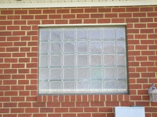 An outside view of our glass block bathroom window replacement in Richmond, Virginia.