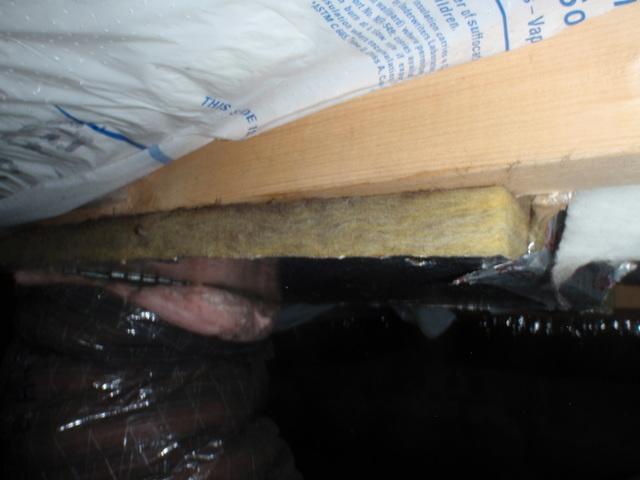 Duct board used to pan a return air supply in the crawlspace draws air in through the sides. This in-balance in the HVAC system causes rooms that are difficult to heat or cool along with indoor air quality problems.