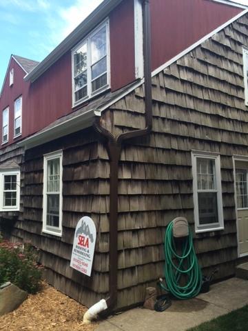 Downspout Services by Sela Gutter Connection in Inver Grove Heights, MN