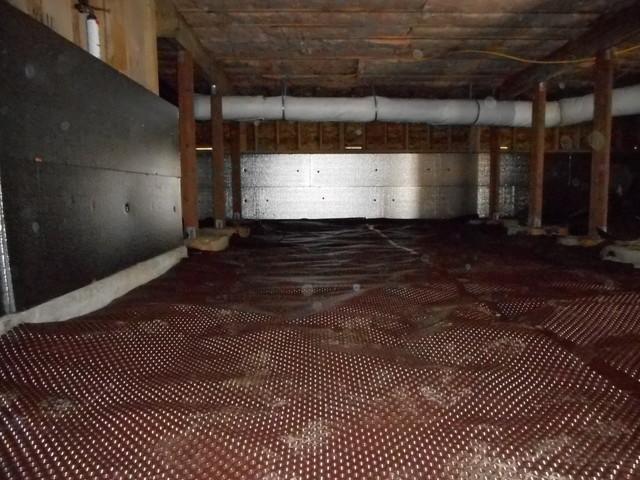 Drainage matting installed in the crawlspace. Call today!