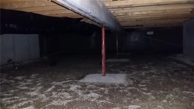Exposed Earth Within a Crawl Space