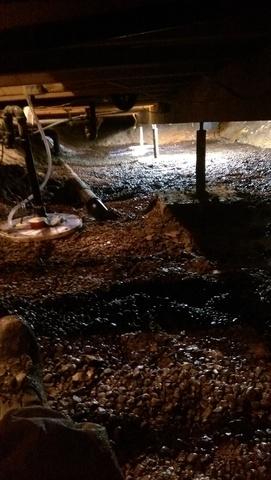 #3  We drained the swamp with crushed rock and a sump pump.