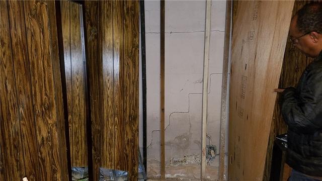 Wall Cracks Behind Paneling