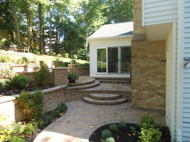 A few steps leading up to a sitting area; conveniently located off the side of the sun room.