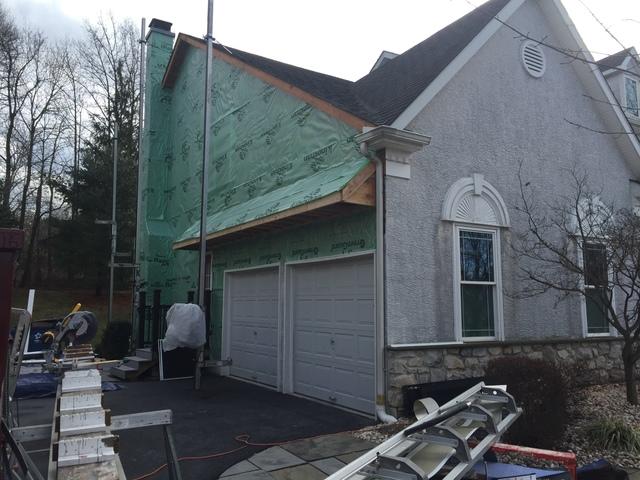 This shows the edition of a garage overhang and the dry-in using greenguard sythethic underlayments.