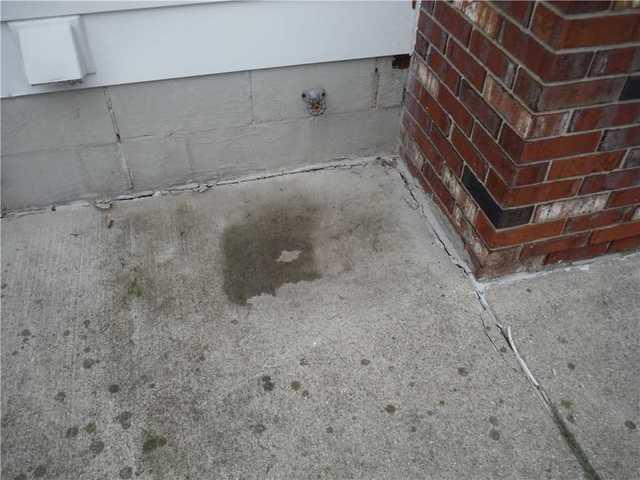 Gaps In Pavement Give Water Access Point To Basement