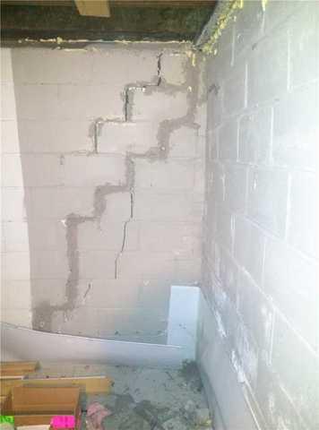 Stairstep and Vertical Cracks in Bowed Wall