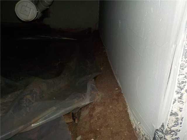 Visible Dirt Floor in Crawl Space