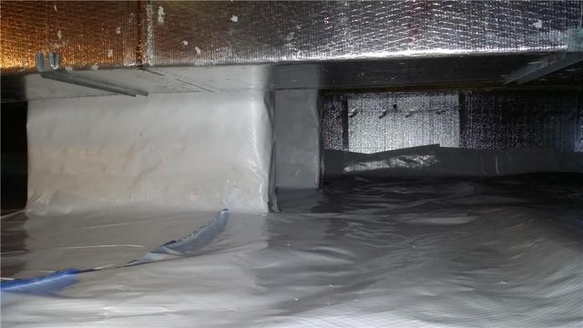 In addition to covering the floor and walls with CleanSpace, we wrap the support piers to protect the wood from any ambient moisture present. This prevents warping and mold and keeps the crawl space stable.