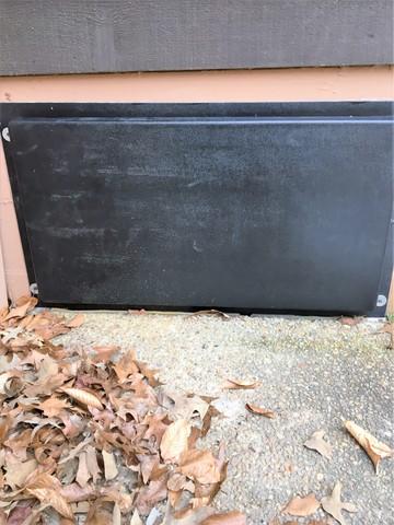 An exterior crawl space door is fitted over the opening to your crawl space, keeping the exterior of you home looking just as it always has.