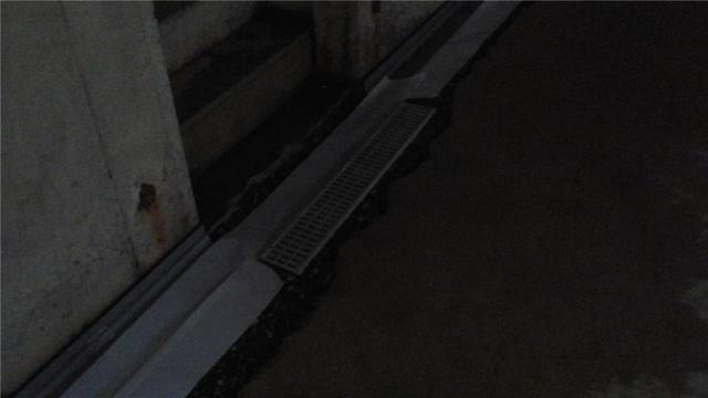 Trench Drain Installed At Base Of Stairs