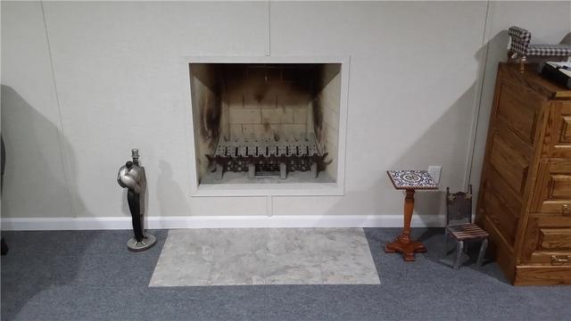 The ThermalDry tile looks great under this fireplace and really makes it a focal point in the room.