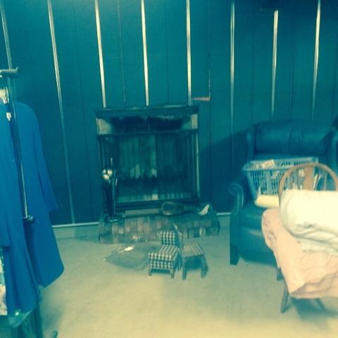 This fireplace looks date and in need of a new look. We'll remove the brick and facade and create a nice modern space.