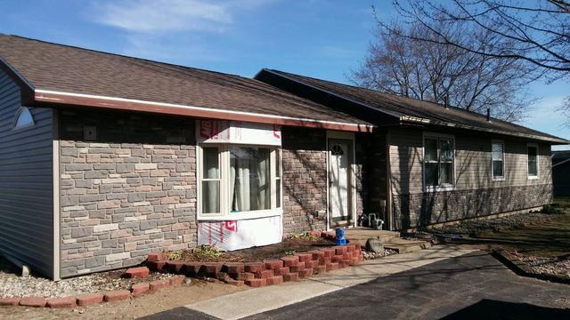 New Siding, Windows and Roof. Gutters are to be installed.