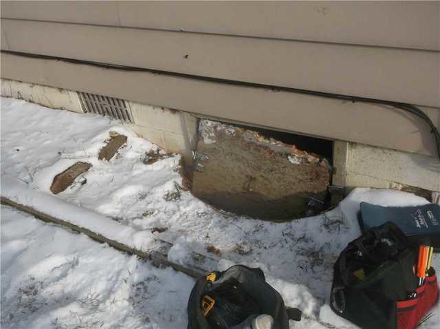 Door and Vents Allow Water Entry in Crawl Space