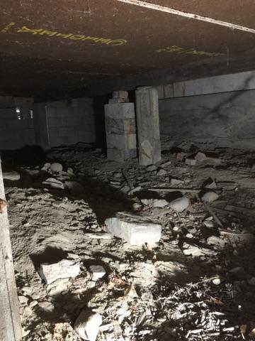 It is not shown in this image but this crawlspace gets very wet and damp. When an area is wet the moisture can rot out floor joists and girders which can lead to structural damage.