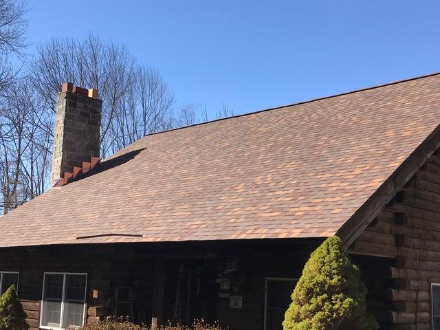 Not only does this roof come with a lifetime warranty, but the new copper flashings and ridge vent add a touch of class and efficiency.