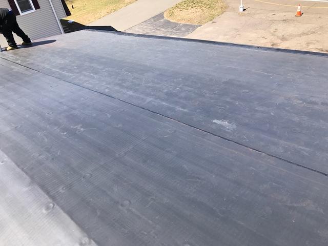 This new rubber roof really gives this roof a different look, wouldn't you agree?