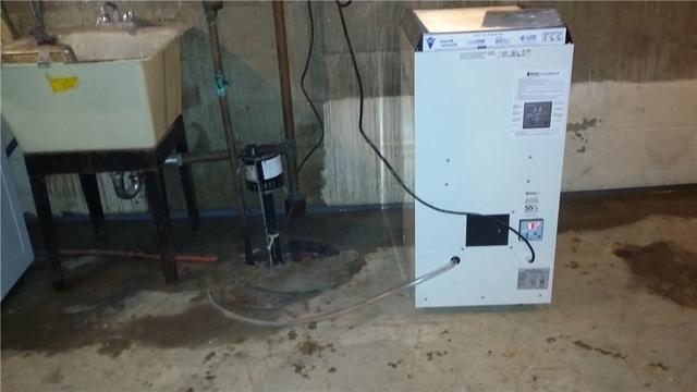 A SaniDry Dehumidifier Is Installed