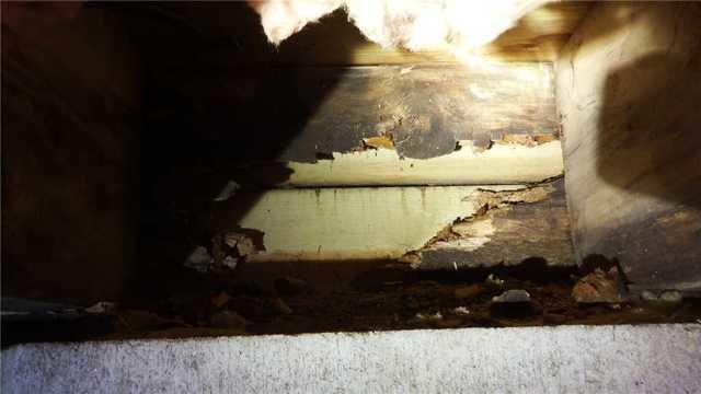 Crumbling Support Beam in Wet Crawl Space