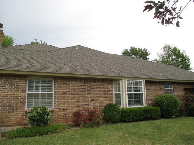 Re-roof on hip roof in Norman