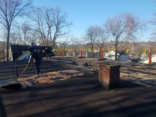 Old roof beginning to be taken off