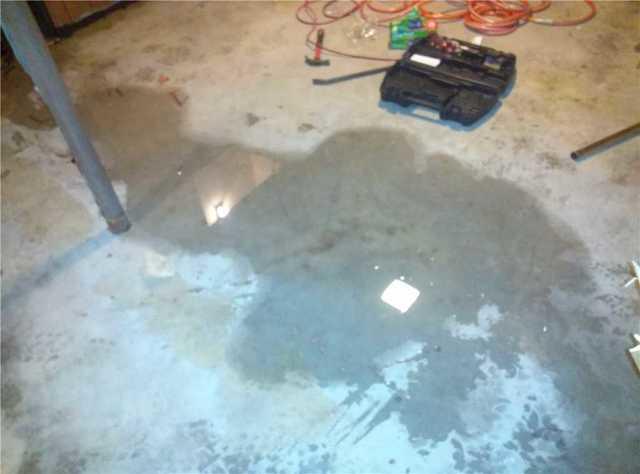 The water has a tendency to puddle in this basement but as the puddles grow larger, water starts to weave around the basement, settling in the low areas.