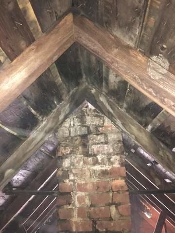 Uninsulated Attic with pre-existing chimney